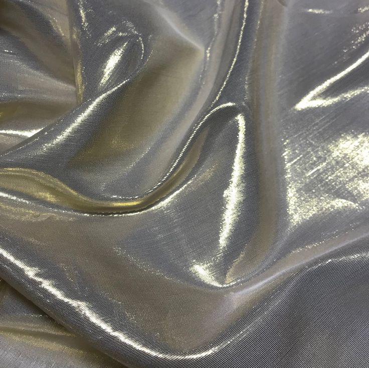 a shiny silver fabric that is very soft