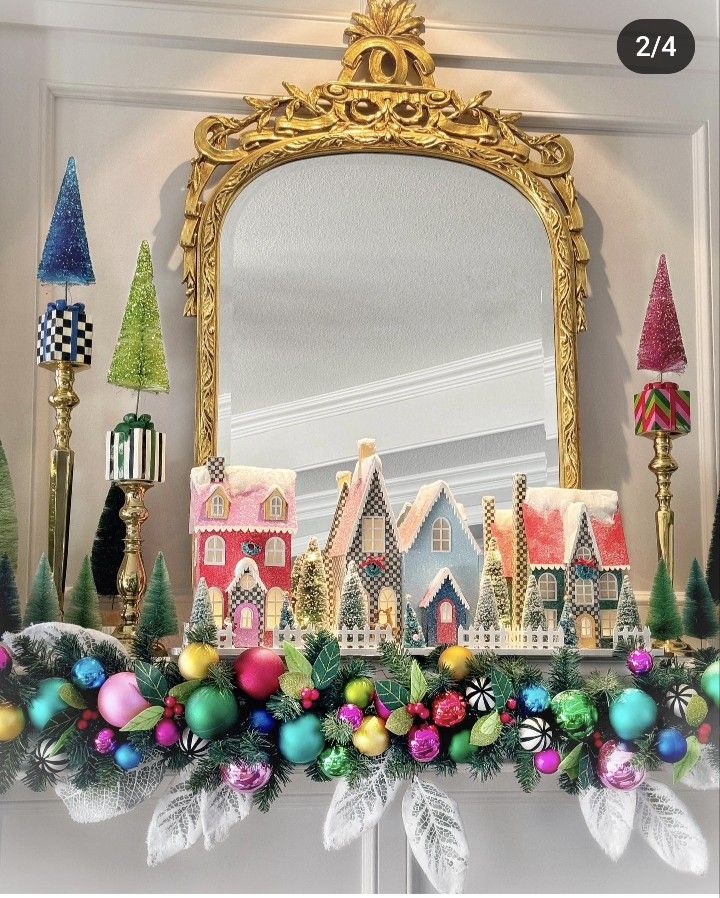 a decorated mantle with christmas decorations and a mirror