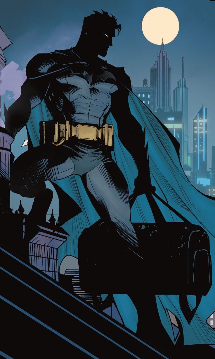 the batman standing on top of a building