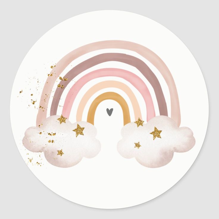 a white round sticker with gold stars and a rainbow in the sky above it