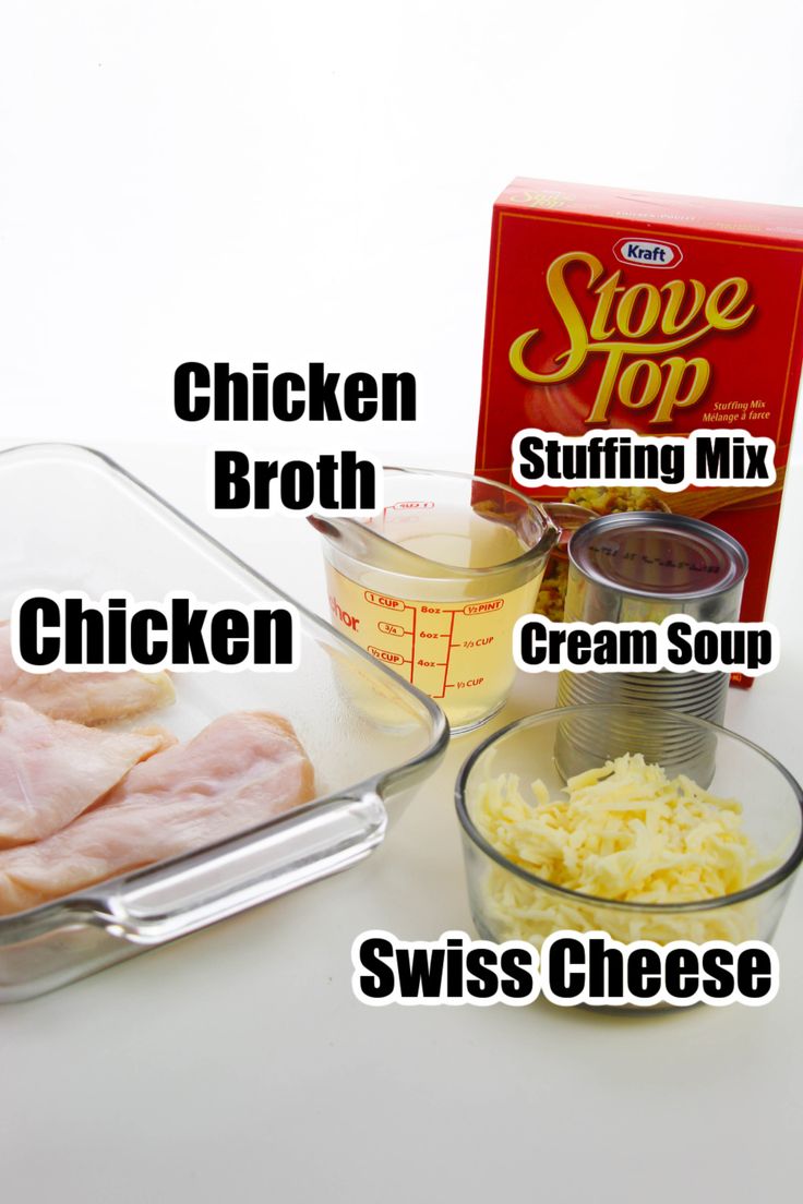 chicken broth, stuffing mix, cream soup, swiss cheese and other ingredients on a table