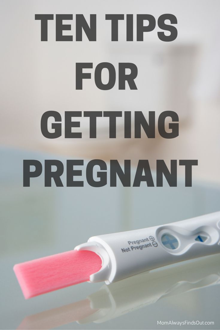 a toothbrush sitting on top of a table with the words ten tips for getting pregnant