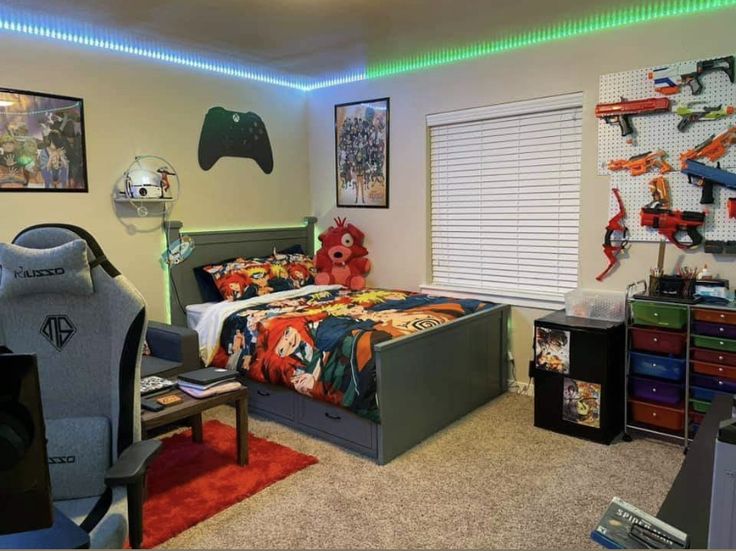 a bedroom with a bed, desk and video game controller