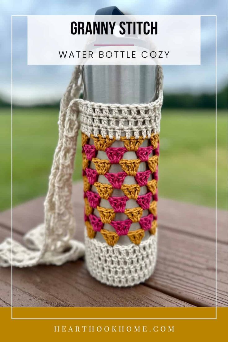 a crocheted water bottle cozy sitting on top of a wooden table with text overlay reading granny stitch water bottle cozy