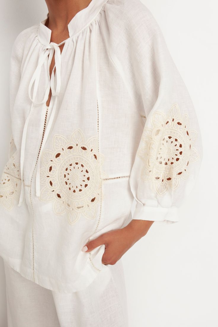 ✨ PRE ORDER: Ships by June 31, 2023 Get a boho look this season with the Leros blouse. Made from 100% linen, this lightweight shirt features a beautiful embroidered daisy details, and a feminine finishing touch. 100% Linen Hand wash Embroidery: 100% Polyester Handmade in Greece GREEK ARCHAIC KORI Spring Bohemian Linen Blouse, Summer Long Sleeve Blouse With Broderie Anglaise, Elegant Linen Blouse For Vacation, Folk Style Long Sleeve Linen Tops, Spring Casual Blouse With Cutwork Hem, Elegant Summer Tops With Embroidered Hem, Long Sleeve Linen Peasant Top For Spring, Summer Long Sleeve Top With Broderie Anglaise, Spring Long Sleeve Embroidered Top With Broderie Anglaise