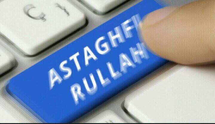 a blue button with the word astagh rullah on it sitting on top of a computer keyboard