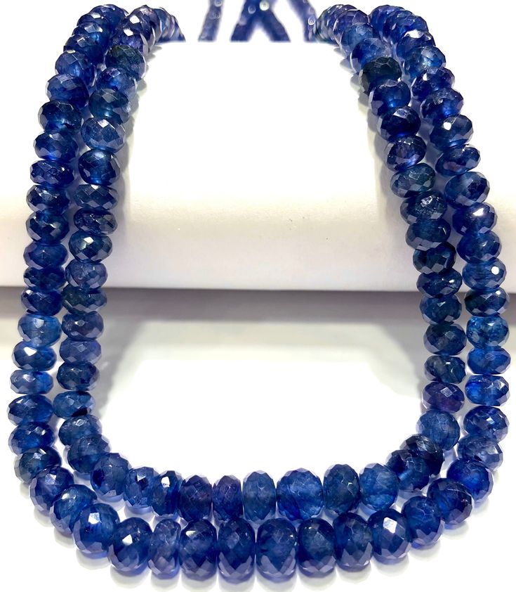 GEMSTONE ----  REAL BLUE SAPPHIRE  STRAND          2 STRAND NECKLACE  SHAPE          ----  RONDELLE WIDTH             5mm to 6.5mm LENGTH       ----  19-19 INCH LONG STRAND TEXTURE      ....   FACETED  COLOR         ....   ROAYL BLUE QUALITY       ....  AAAA++ COLOR          SPARKLING BLUE HOLE SIZE     0.6 MM WE ACCEPT WHOLESALE ORDERS BEAUTIFUL STRAND NATURAL BLUE SAPPHIRE BEADS THIS NATURAL BLUE SAPPHIRE BEADS ARE  VERY RARE AND EXTREMELY BEAUTIFUL THEY HAVE CLEAR AND CLEAN BODY THEY LOOK BEAUTIFUL ON NECK HIGH QUALITY BEADS 100% SATISFACTION GUARANTEED WHOLESALE SHOP // WHOLESALE PRICE 2 Layer Necklace, Necklace Sapphire, Sapphire Beads, Blue Hole, Layer Necklace, Clean Body, Natural Blue Sapphire, Sapphire Gemstone, Burmese