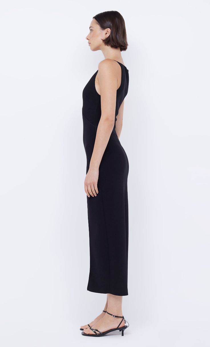 The BEC + BRIDGE Marielle Split Dress is cut from our signature stretch bonded crepe fabric in a classic silhouette. The midi dress features a high cut, straight neckline that flatters the silhouette and statement keyhole cutout detail at the centre front, with a front thigh high split. Evening Midi Bodycon Dress, Elegant Stretch Midi Dress With Cutout, Stretch Cutout Midi Dress For Evening, Stretch Midi Dress With Cutout For Evening, Evening Midi Dress With Flattering Silhouette, Sleek Cocktail Midi Dress With Side Slits, Sleek Sheath Midi Dress, Chic Sleeveless Midi Dress For Black-tie Events, Elegant Stretch Dress With Cutout