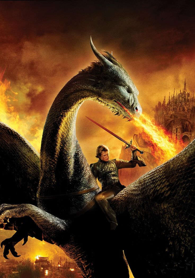 a man riding on the back of a dragon in front of a fire filled sky