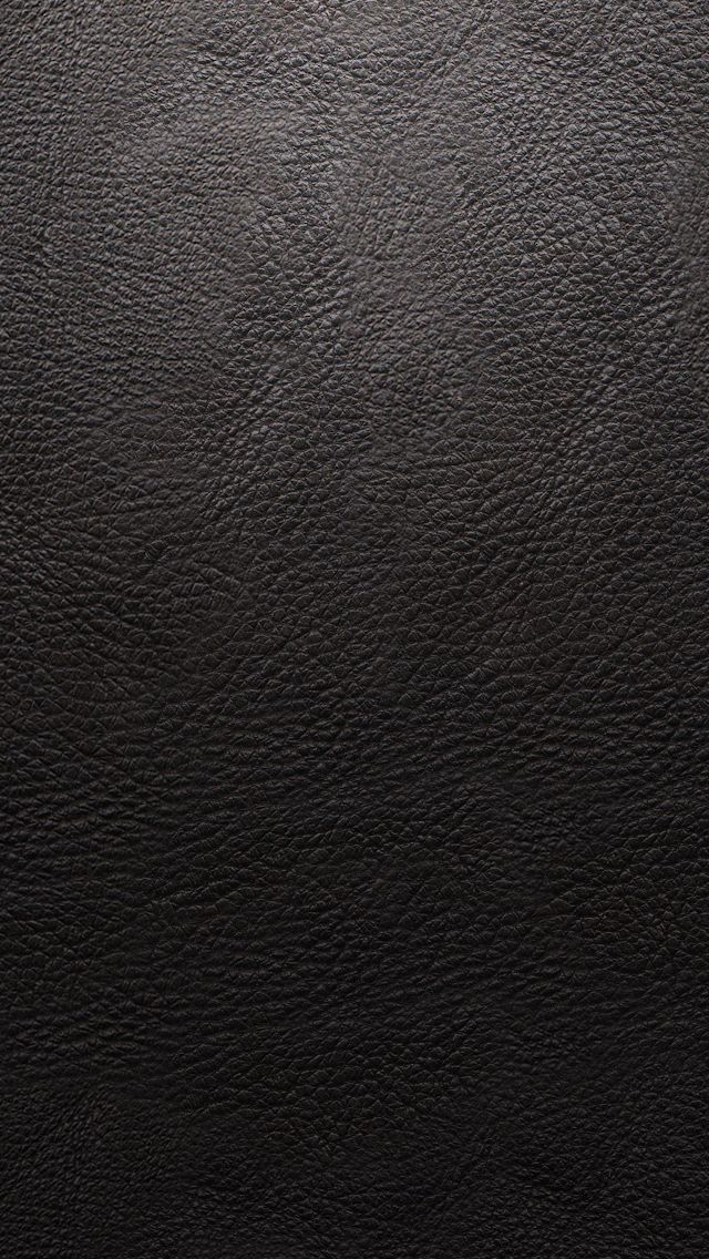 a black leather texture background that looks like it could be used as a wallpaper