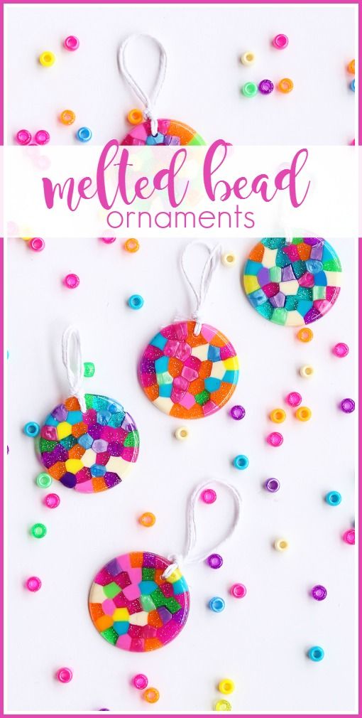 some colorful beads are hanging from a string on a white background with the words melted bead ornaments