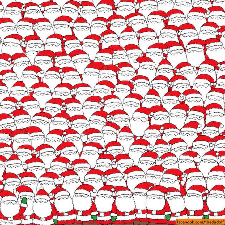 a lot of santa hats that are in the shape of men's heads, all red and white