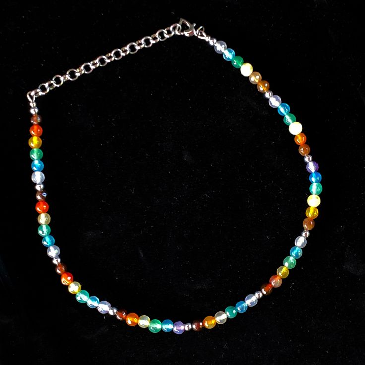 Indulge in the beauty of diversity with this exquisite Rainbow pattern Agate gemstone necklace. Let it adorn your neck with a vibrant array of colors, capturing the essence of Pride. metal is silver plated alloy 15" long, 3.5" chain, 18.5" total length We do our best to choose each stone carefully and purposefully for every piece.. However there might be slight differences in color size shape and clarity which makes each item unique and one of a kind. Each piece of jewelry will come in a colored Multicolor Round Beads Metal Necklace, Multicolor Metal Necklaces With Round Beads, Multicolor Metal Round Bead Necklaces, Adjustable Multicolor Czech Glass Necklace, Multicolor Metal Beaded Necklaces With Round Beads, Multicolor Round Beads Metal Jewelry, Multicolor 16-inch Necklaces As Gifts, Multicolor Metal Necklace Nickel-free, Adjustable Multicolor Czech Glass Jewelry