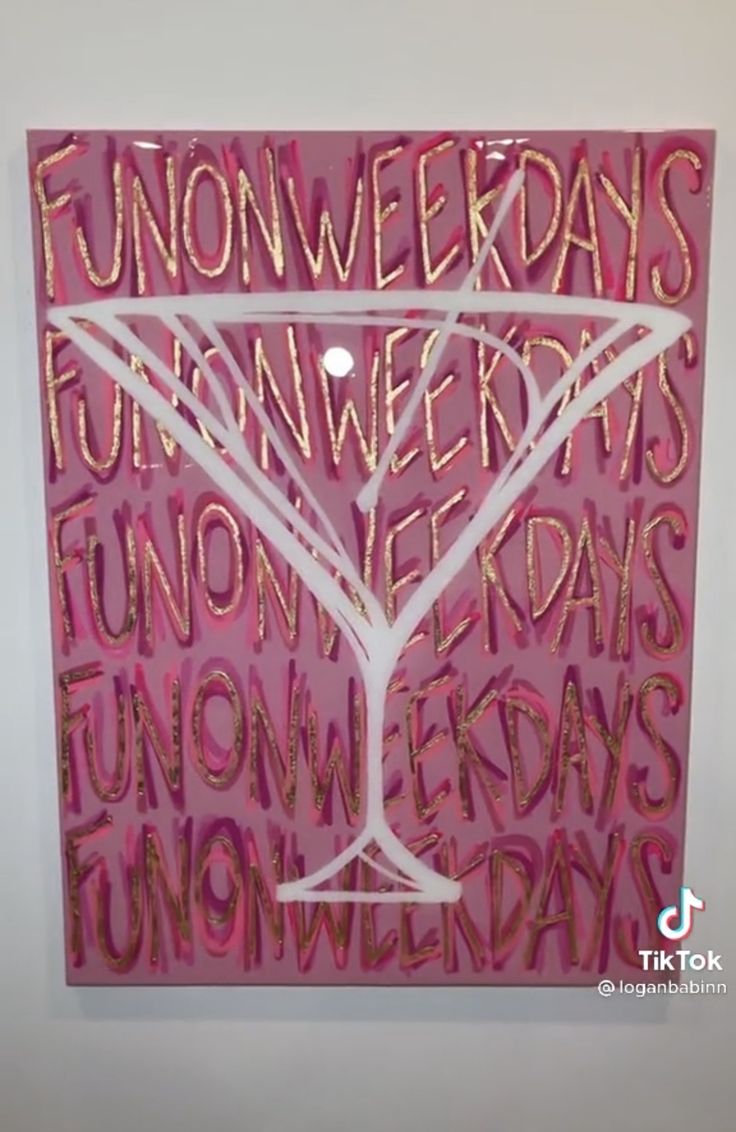 a pink painting with words written on it