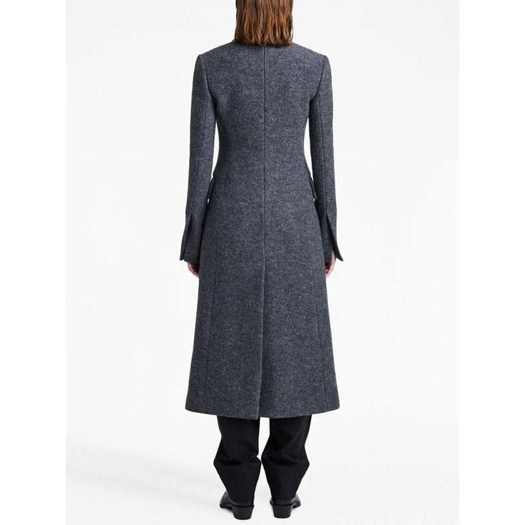 Discover Timeless Elegance Step into the season with style and sophistication in our Elegant Woolen Long Coat for Women. Tailored to perfection, this slim-fit overcoat is a must-have for the fashion-forward woman. Its classic design and modern touches make it the perfect outerwear for any occasion, be it a day at the office or an evening out. Product Features Material: Crafted from a luxurious blend of wool and polyester, ensuring both warmth and durability. Design: Featuring a stylish turn-down collar and a chic single-button closure, this coat epitomizes elegance. Sleeves: Full-length sleeves with a regular sleeve style, perfect for layering over your favorite outfits. Pattern: The solid color pattern adds a touch of sophistication, making it a versatile addition to your wardrobe. Length Elegant Luxury Single-breasted Wool Coat, Elegant Long-sleeved Merino Wool Sweater Coat, Semi-formal Long Wool Coat With Double Button Closure, Formal Single-breasted Wool Coat With Stand Collar, Formal Long-sleeve Wool Coat With Double-breasted Fastening, Couple Silhouette, Cardigan Sweater Vest, Middle Aged Women, Perfect Coat