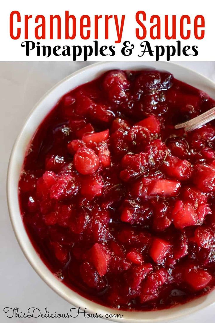 cranberry sauce with pineapples and apples in a white bowl