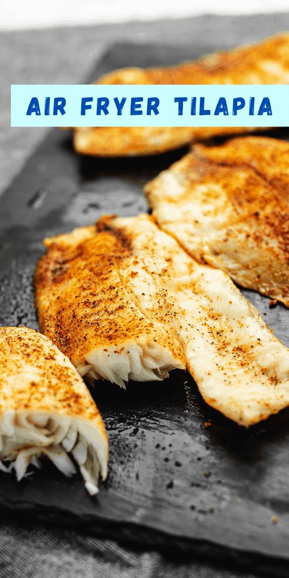 grilled fish sitting on top of a pan with the words air fryer tilapia