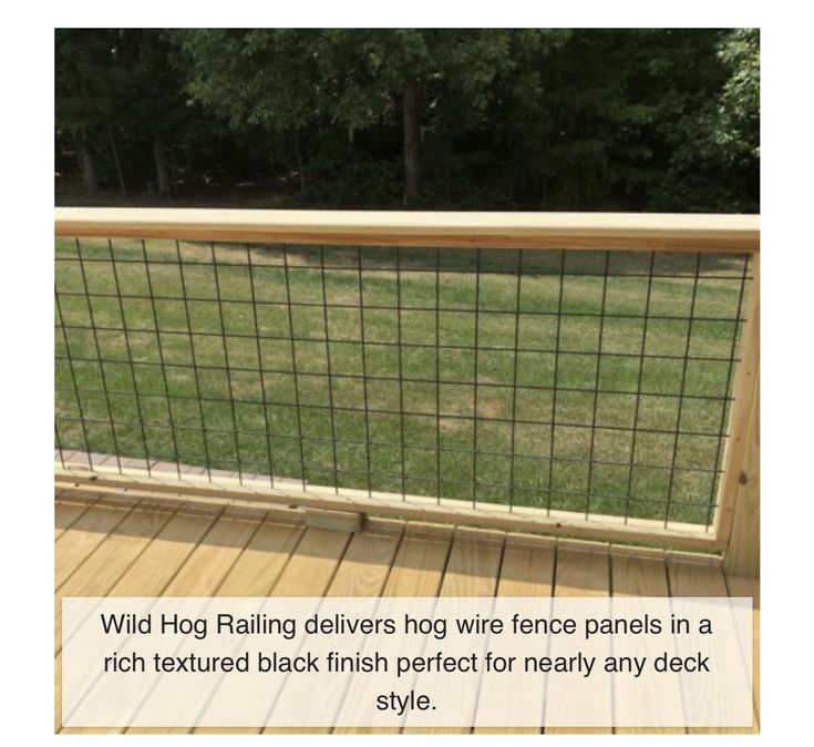 a wooden deck with a metal fence on it and the words wild hog railing delivers wire fence panels in a rich textured black finish perfect for nearly any deck style