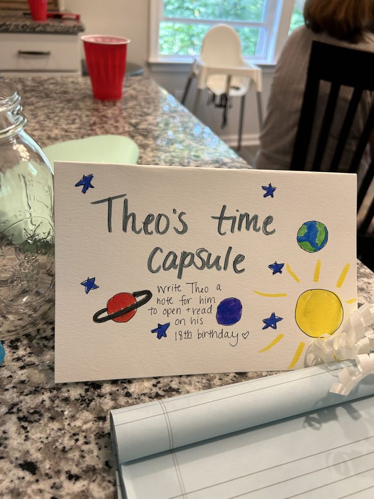 there is a sign that says they's time capsule on the counter in this kitchen