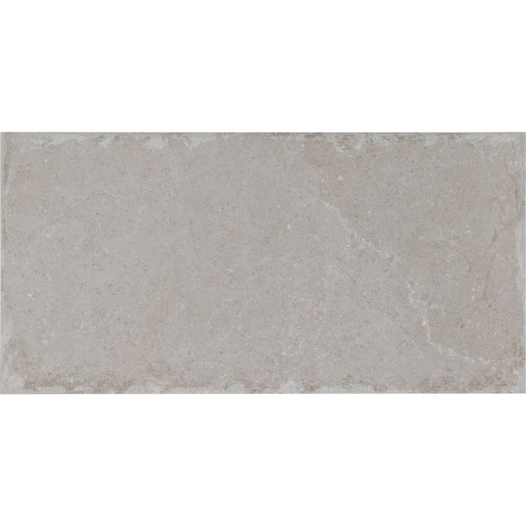 an image of a white marble tile with grey veining on the bottom and sides