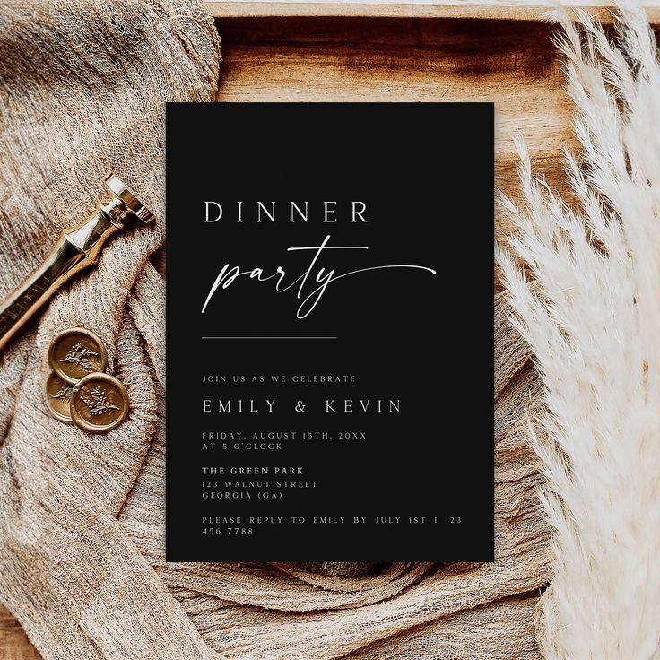 a black dinner party card on top of a table