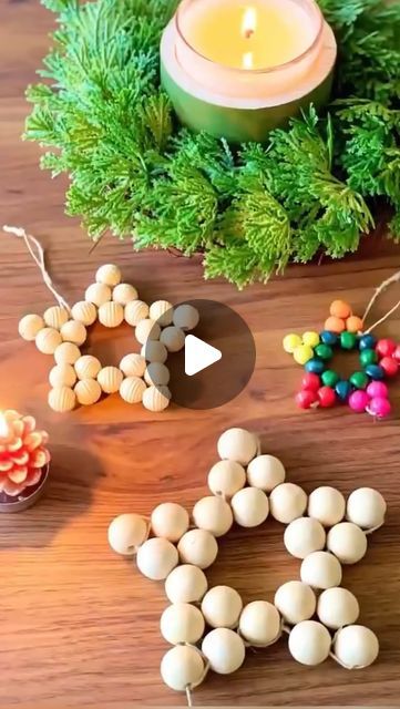 an assortment of beads and candles on a table