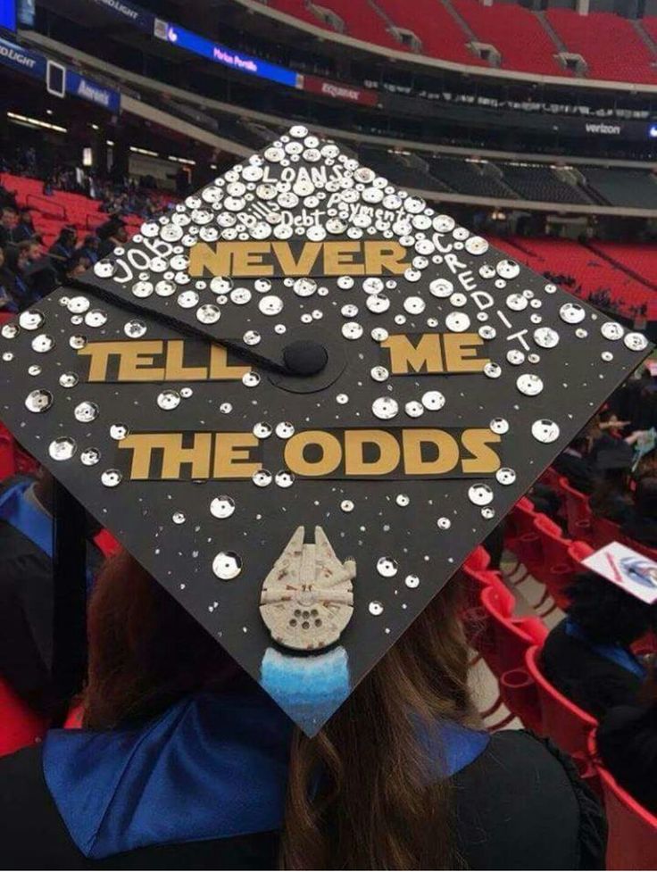 a graduation cap that says never tell me the odds