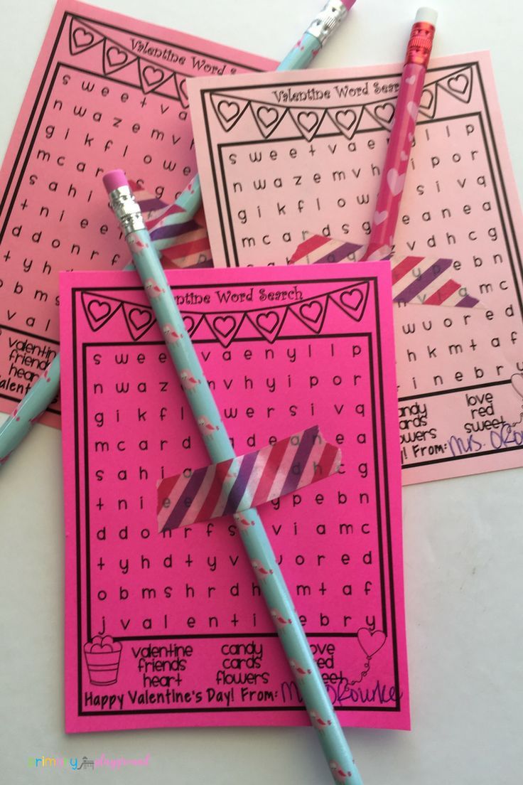 three valentine's day word search cards with two pens