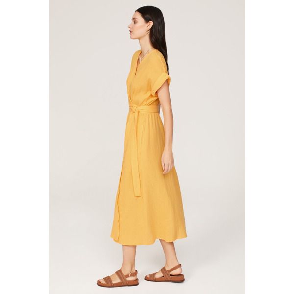 Yellow cotton (100% Cotton). Wrap. Short sleeves. V-neck. Tie closure. 50.5" from shoulder to hemline. Imported. Daytime Linen V-neck Dress, Chic V-neck Maxi Dress For Daytime, Summer V-neck Workwear Dress, V-neck Maxi Dress For Daytime, Linen V-neck Dress For Daytime, Cotton Short Sleeve V-neck Summer Dress, Short Sleeve Cotton V-neck Dress For Summer, Summer Cotton V-neck Dress With Short Sleeves, Cotton V-neck Workwear Dress