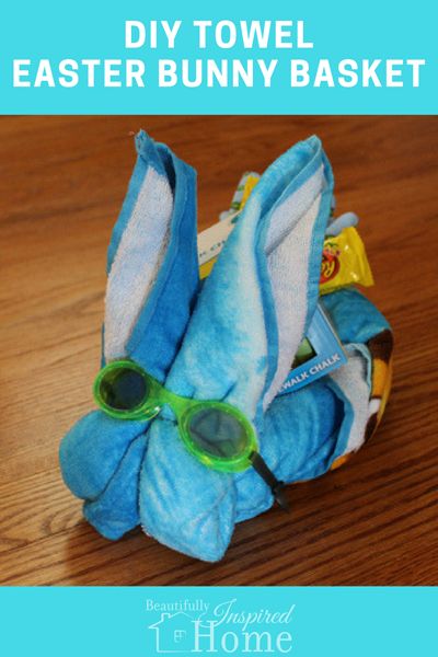 a stuffed animal with sunglasses on it's head and the words diy towel easter bunny basket