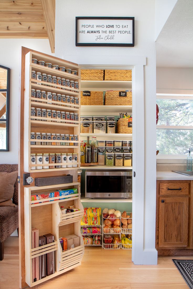 an open pantry with lots of food in it