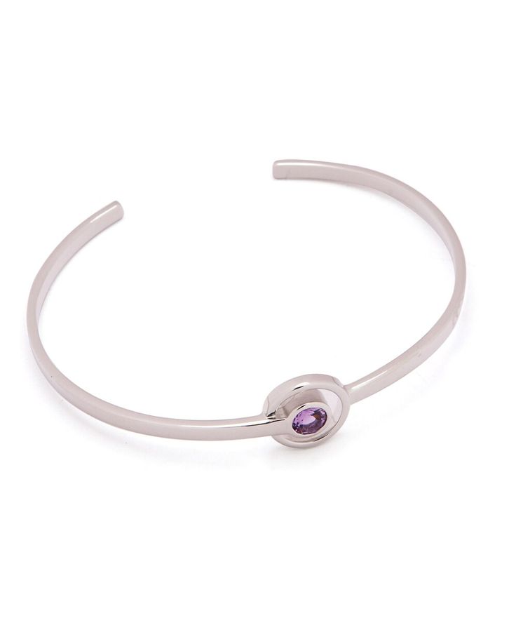 The healing power of gemstone fuses with modern design in this sterling silver cuff bracelet. Made with minimal details and featuring simple geometry, it's a fashionably contemporary way to enjoy amethyst's unique properties. Connected to the crown Chakra, amethyst is called a stone of spirituality and wisdom. Amethyst is known to encourage spiritual growth and wisdom by helping the user tap into the divine. Cuff measures about 6.5 inches and has an open design that can adjust to fit most wrist Modern Purple Bracelet As Gift, Modern Adjustable Purple Jewelry, Modern Gemstone Cuff Bracelet For Formal Occasions, Modern Sterling Silver Bracelet With Gemstone, Modern Silver Bangle With Gemstone, Modern Silver Gemstone Bangle, Modern Silver Bracelets With Gemstones, Contemporary Sterling Silver Bangle As Gift, Modern Amethyst Jewelry