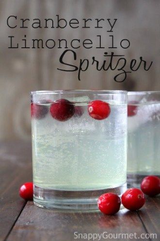 cranberry lemoncello spritzer in two glasses on a wooden table