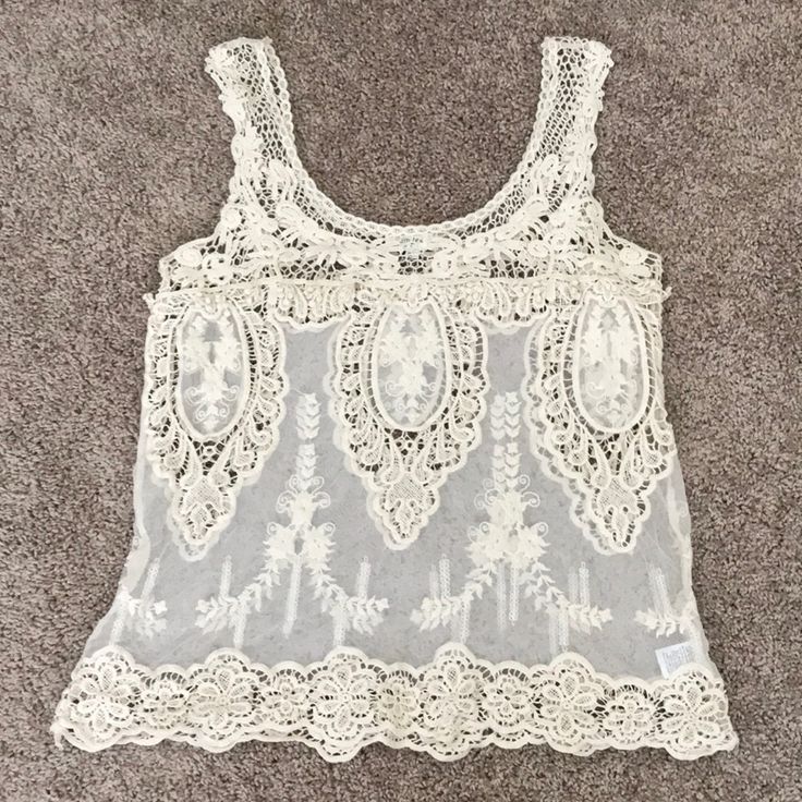 Sheer Crochet And Lace Detail Tank In Ivory Sleeveless Lace Patchwork For Summer, Cream Lace Top For Beach, Cream Lace Top For The Beach, Summer Beige Tops With Delicate Lace, Cream Lace Patchwork Top For Summer, Beige Delicate Lace Summer Tops, Summer Beige Delicate Lace Top, Cream Lace Top For Beach In Summer, Cream Lace Top For Summer Beach Outing