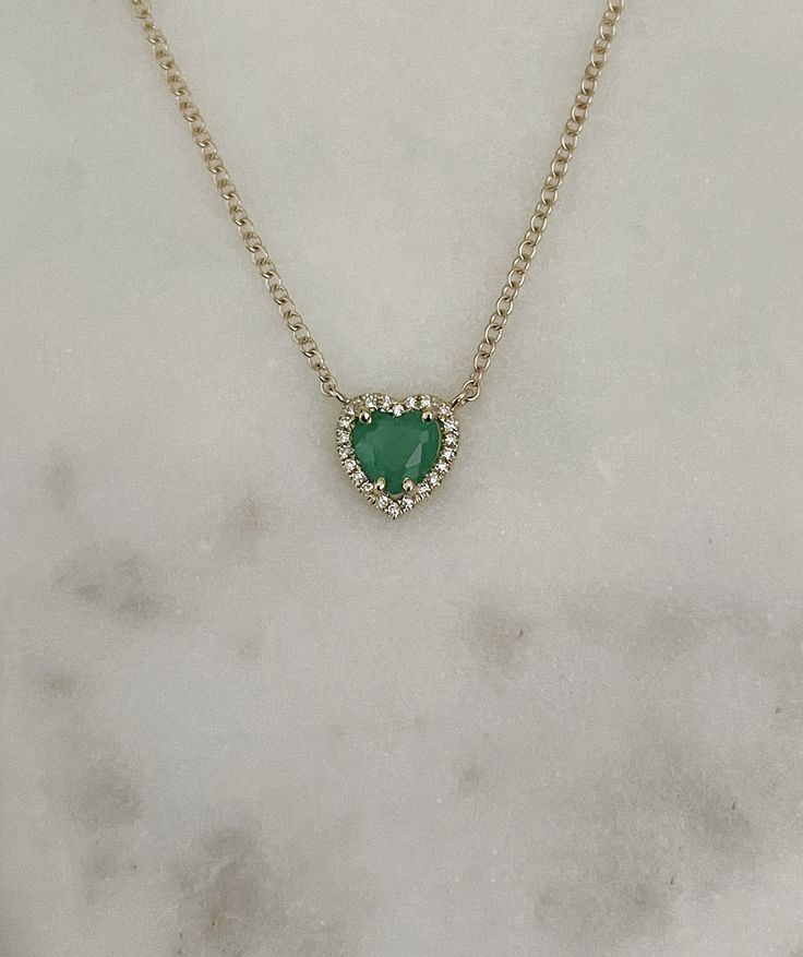 14K Solid Yellow Gold 0.55 Carat Emerald 0.04 Carat Diamond (VS-SI G-H) Heart is 7MM Adjustable Length 16, 17, 18 inches Formal Heart Cut Birthstone Necklace, Gold Emerald Heart Cut Jewelry, Luxury Heart-shaped Emerald Jewelry, Heart Cut Emerald Jewelry In Yellow Gold, Heart Cut Emerald Necklace For Anniversary, Emerald Heart Cut Necklace For Anniversary, Elegant Emerald Jewelry With Heart Charm, Fine Jewelry May Birthstone Heart Cut Necklace, Formal Green Heart Pendant Necklaces