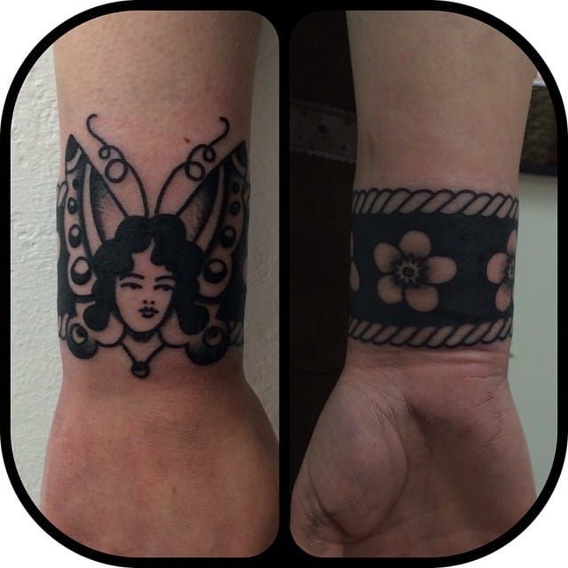 two tattoos on the wrist of people with black and white designs, one has a woman's face