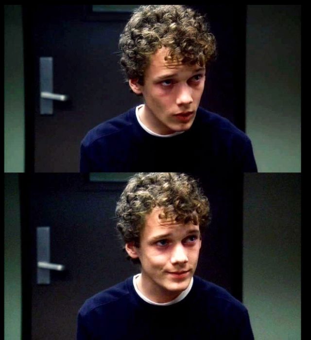 four different shots of a young man with curly hair and wearing a black sweater, looking at the camera