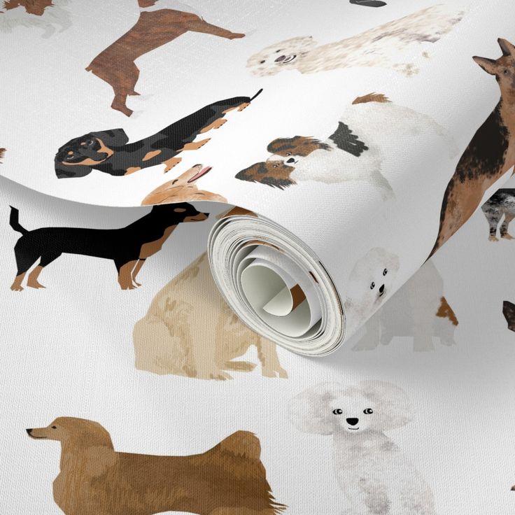 a dog wallpaper with dogs on it and white paper next to the wall,