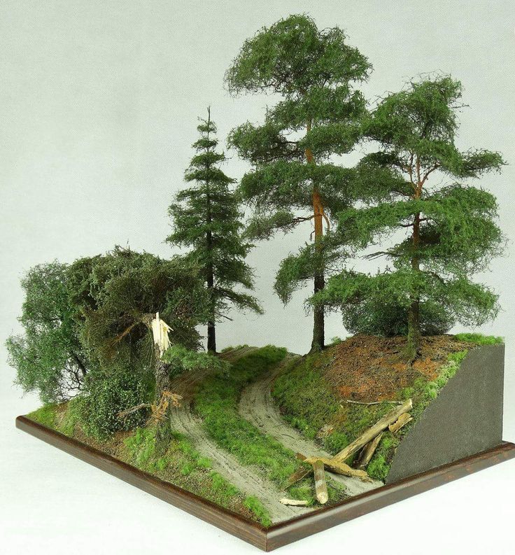 a miniature model of trees on top of a hill