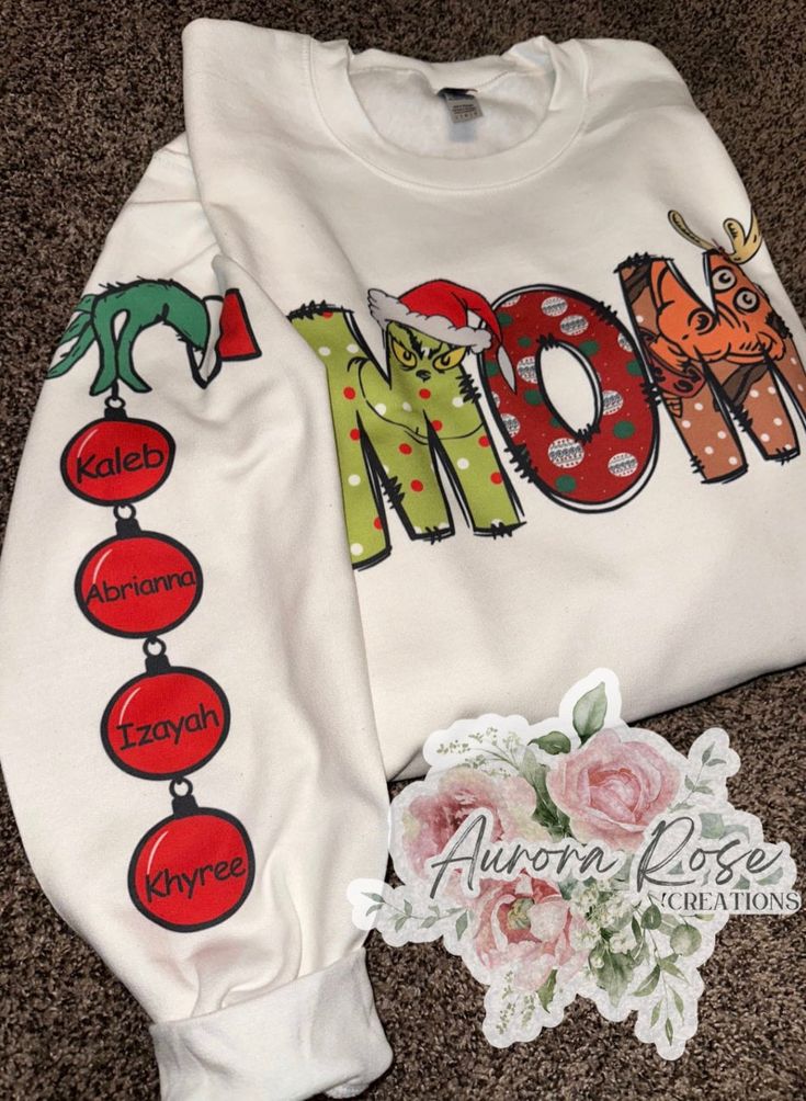 Personalized sweatshirts! 4 ornaments MAX per arm Sublimation design!  Unisex sweatshirt 50/50 cotton polyester Wash inside out in cold water! Hang dry or tumble dry. Max The Grinch, Grinch Hoodie, Grinch Christmas Sweater, Personalized Sweatshirts, Grinch Shirts, Embroidered Jean Jacket, Grandma Sweater, Christmas Grinch, Mom Sweater