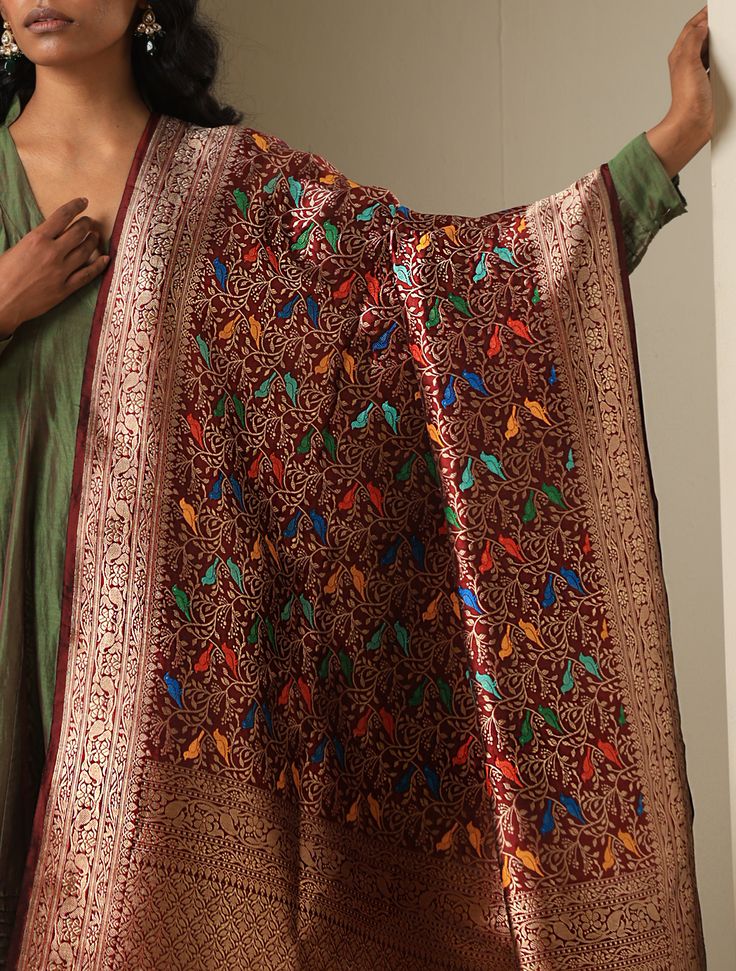 Introducing the Chidiya Banarasi Silk Collection, a celebration of elegance and tradition in the world of Indian textiles. Crafted with meticulous attention to detail, each piece in this collection showcases the timeless beauty of Banarasi silk adorned with intricate Chidiya (bird) motifs. Drawing inspiration from nature's grace, the Chidiya Banarasi Silk Collection offers a stunning array of sarees, dupattas, and garments, reflecting the rich heritage of Varanasi's weaving tradition. Immerse yo Luxury Handloom Brocade Dupatta, Multicolor Meenakari Embroidered Fabric For Festivals, Diwali Traditional Patterned Jamawar Pashmina Shawl, Festive Multicolor Meenakari Embroidered Fabric, Jamawar Pashmina Shawl With Traditional Patterns For Ceremonies, Luxury Katan Silk Dupatta With Printed Border, Multicolor Pashmina Shawl With Zari Work For Diwali, Raw Silk Meenakari Dupatta, Celebration Tussar Silk Dupatta With Motifs