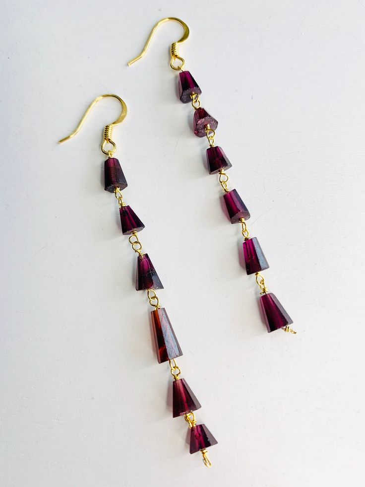 Elegant Garnet Earrings.  High quality Garnet stones.  Fabulous gift.  Garnet is known to bring luck and prosperity.  These beautiful earrings will not disappoint.  They make a great gift! Elegant Long Drop Clip-on Earrings For Gifts, Elegant Faceted Earrings For Gift, Crystal Dangle Earrings For Pierced Ears As Gift, Gift Beaded Long Drop Earrings, Handmade Crystal Drop Earrings For Celebration, Faceted Long Drop Earrings For Party, Long Drop Beaded Earrings For Gift, Gift Crystal Dangle Earrings For Pierced Ears, Elegant Long Drop Beaded Earrings As Gift