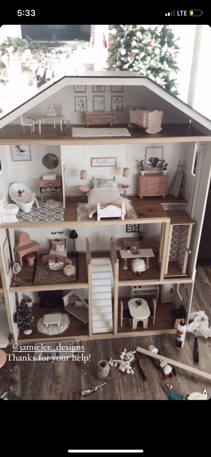 a doll house with all the furniture and accessories