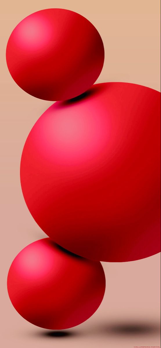 three red balls are stacked on top of each other in the shape of an object