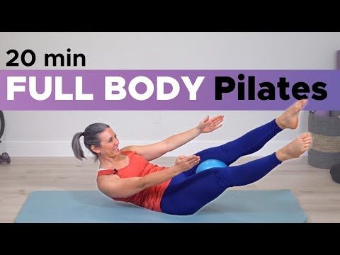 a woman doing a full body pilates exercise on a blue mat with the words, 20 min full body pilates