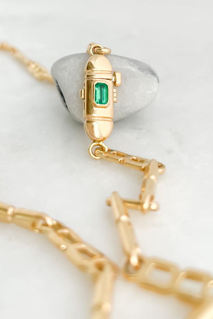 Tube Necklace from HOWL 18k yellow gold chain necklace Emerald clasp with hinged safety lock Length: 18" Each HOWL piece comes engraved with a serial number Made in Los Angeles Gold Toggle Necklace With Rectangular Links, Howl Pendragon Necklace, Howl Necklace Anime, Howl's Moving Castle Necklace, Luxury Classic Gold-tone Toggle Necklace, Swim Jewelry, Tube Necklace, Back Jewelry, Ring Pendant Necklace