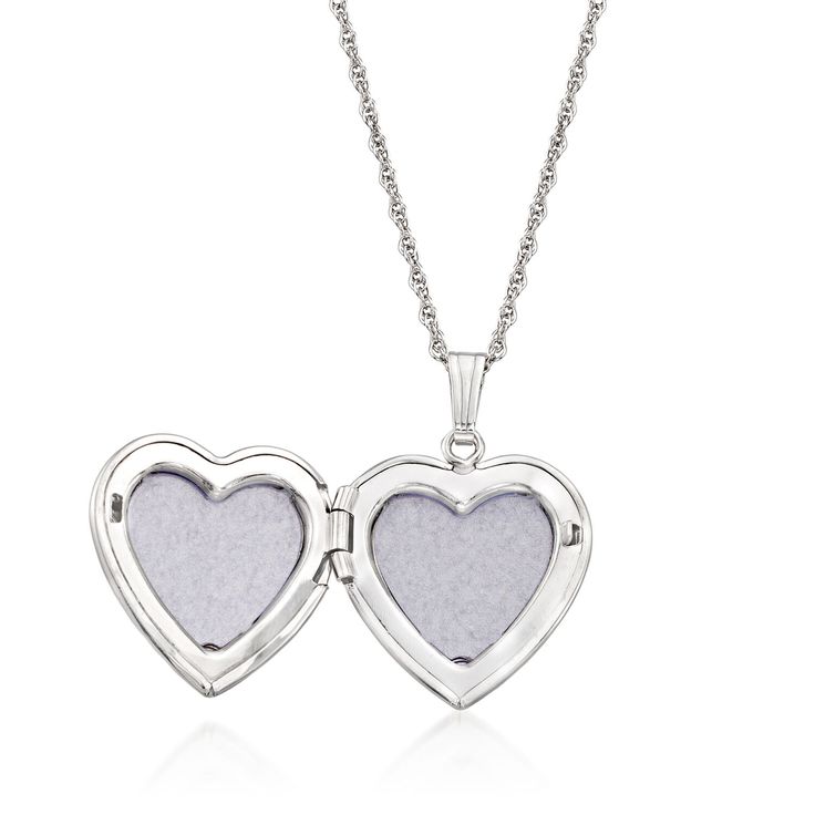 Ross-Simons - Plain - Sterling Silver Heart Locket Necklace. 18". Crafted in textured and polished sterling silver, this feminine heart locket features a lovely etched design of flowers and leaves. Open to reveal your own personal 1/2" photo or keepsake. Suspends from a rope chain. Springring clasp, sterling silver heart locket necklace. Locket Necklace Drawing, Valentine's Day Sterling Silver Heart Cut Locket Necklace, Silver Heart Pendant Locket Necklace With Polished Finish, Sterling Silver Heart Locket Necklace For Mother's Day, Sterling Silver Memorial Locket Necklace For Valentine's Day, Sterling Silver Locket Necklace For Memorial On Valentine's Day, Silver Heart Pendant Locket Necklace With Hallmark, Silver Heart Pendant Locket Necklace For Anniversary, Valentine's Day Sterling Silver Locket Necklace Medallion