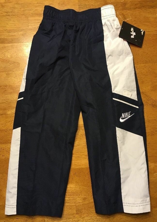 Nike Boy's Blue & White Polyester Athletic Pants, Youth Size 4. New with tags. May have some creases/lines from folded storage and may have a few exposed thread tails. Smoke and pet free environment. Fit can never be guaranteed, please consider before ordering. See photos for details, thanks for shopping!  Looking for more high-quality clothing from brands such as Hollister, Adidas, Nike, Abercrombie & Fitch, Under Armour and many more? Head over to our store and see what we have to offer! Nike Navy Bottoms For Streetwear, Nike Blue Cotton Pants, Nike Blue Sweatpants With Pockets, Blue Nike Bottoms With Pockets, Nike Navy Cotton Bottoms, Navy Cotton Nike Bottoms, Sporty Blue Cotton Cargo Pants, Nike Boy, Boy Blue