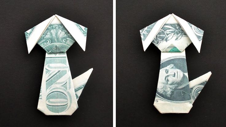 origami dollar bill folded into an origami man's necktie