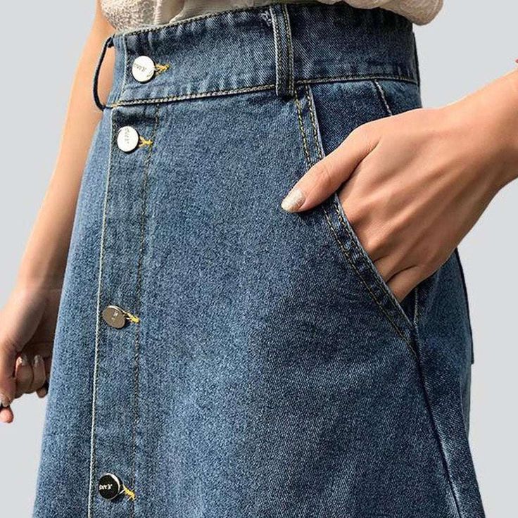 Make a bold statement this spring with our street-style inspired 2023 Spring-Summer a-line button-down denim skirt! Crafted with a high-waisted. slim fit silhouette and classic buttoned closure. this vintage-inspired piece is the perfect balance of fashion and comfort.Key Highlights: A-line Silhouette: Perfectly captures the effortless look of a vintage skirt with a contemporary. a-line fit. Buttoned Closure: Crafted with classic buttons for a timeless look. High-waisted Fit: Designed to hug you